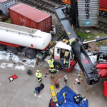 Un tren choca contra una grúa en el Puerto Seco de Azuqueca de Henares y esta cae sobre la cabina de un camión causando heridas a su conductor: también ha sufrido lesiones el técnico de la grúa